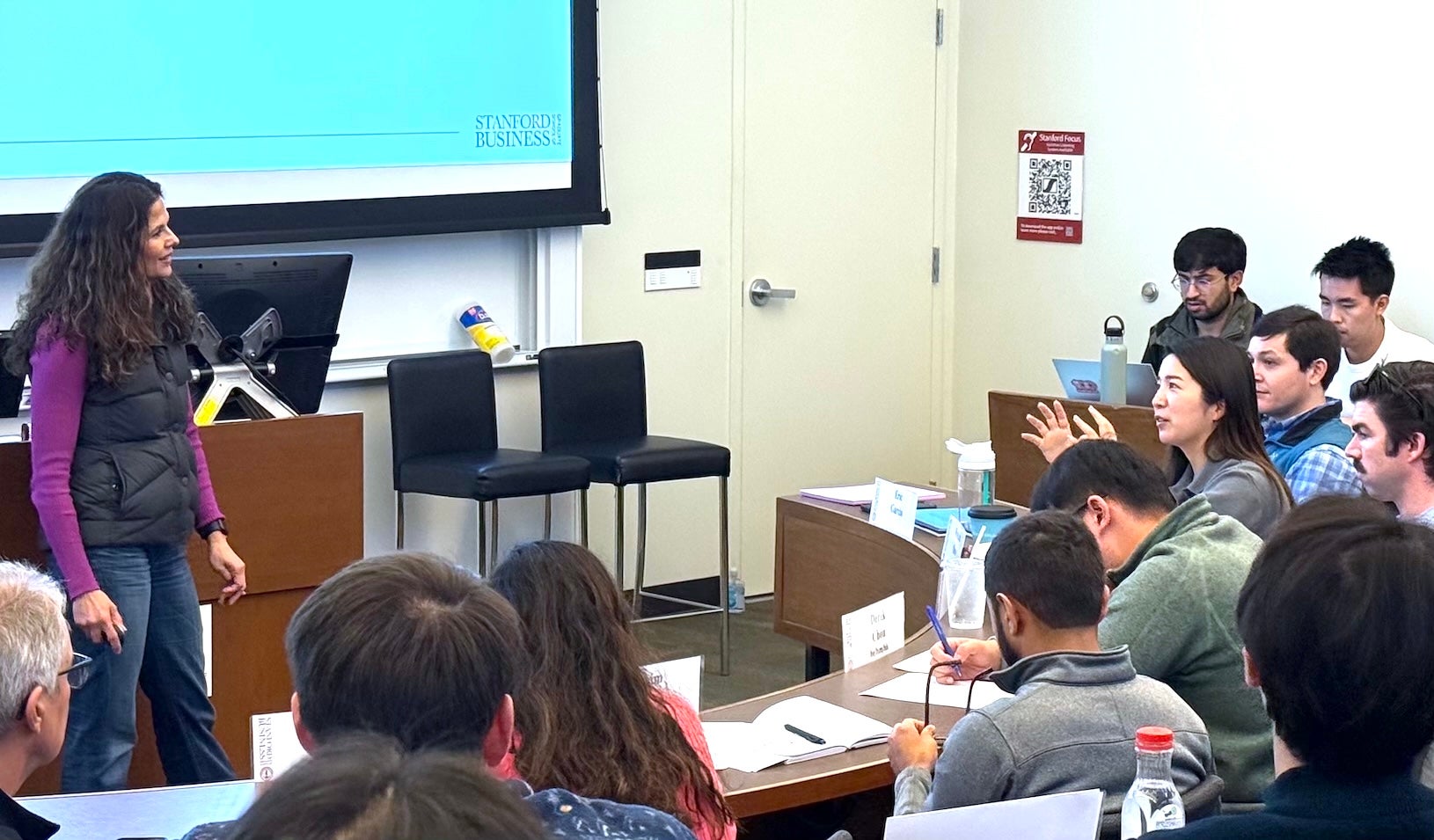 GSB Lecturer Monisha Perkash in discussion with a student during Ecopreneurship Foundations.