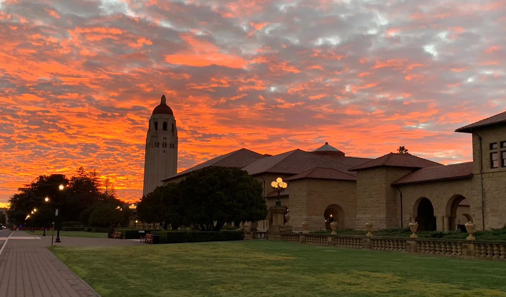 Stanford Campus and Hoover tower on a cloudy and colorful morning during sunrise. | Credit: Paul Oyer. 