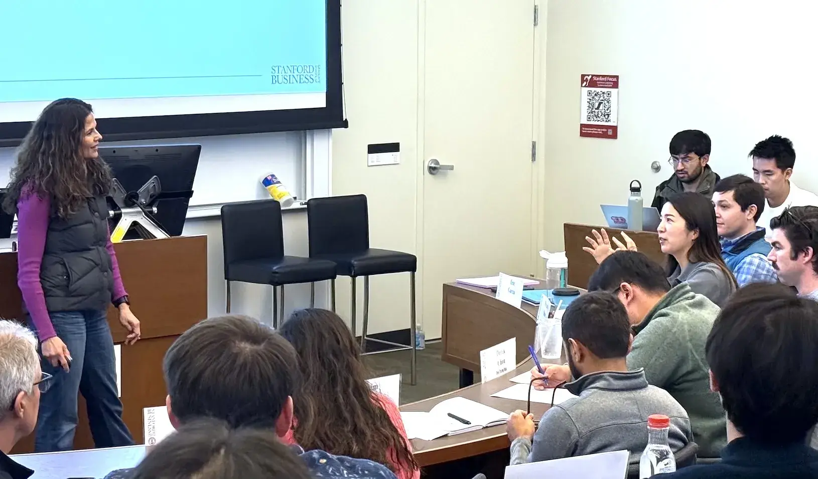 GSB Lecturer Monisha Perkash in discussion with a student during Ecopreneurship Foundations.