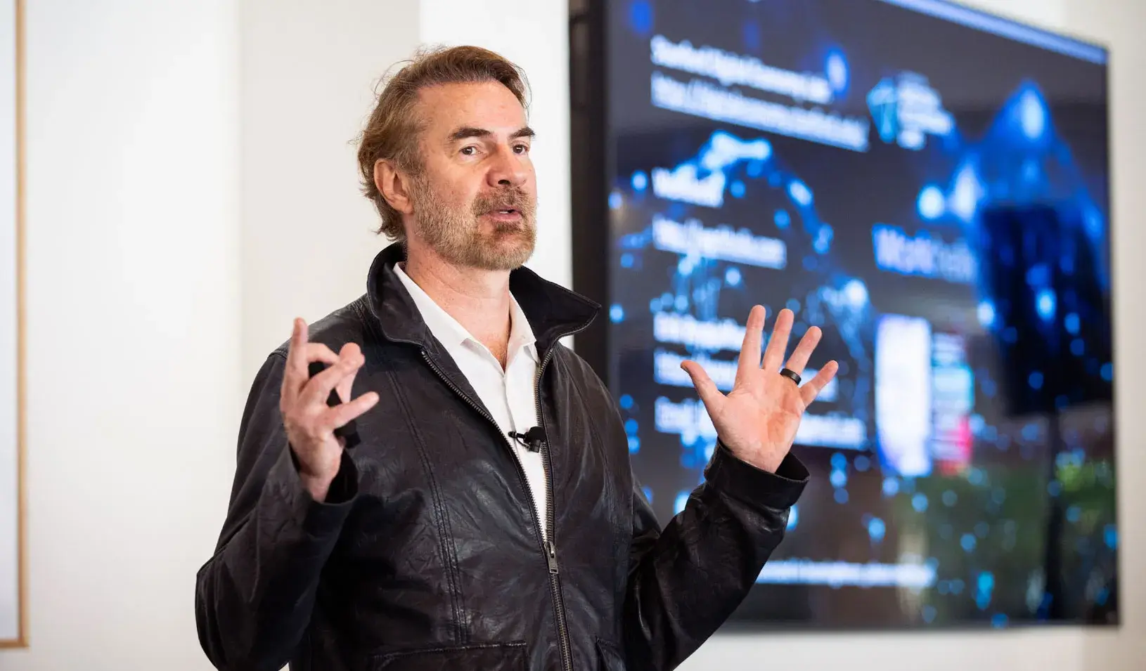 Stanford Professor Erik Brynjolfsson discusses the Turing Trap and AI augmentation strategy at the Stanford Leadership Institute AI@Work Executive Forum