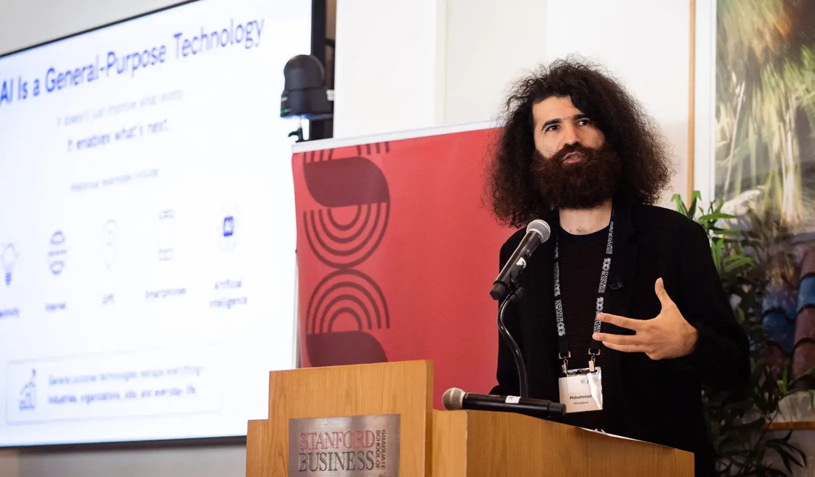Mohammad Akbarpour, Stanford GSB economics professor, presents on AI as a general purpose technology at the Stanford Leadership Institute AI@Work Executive Forum