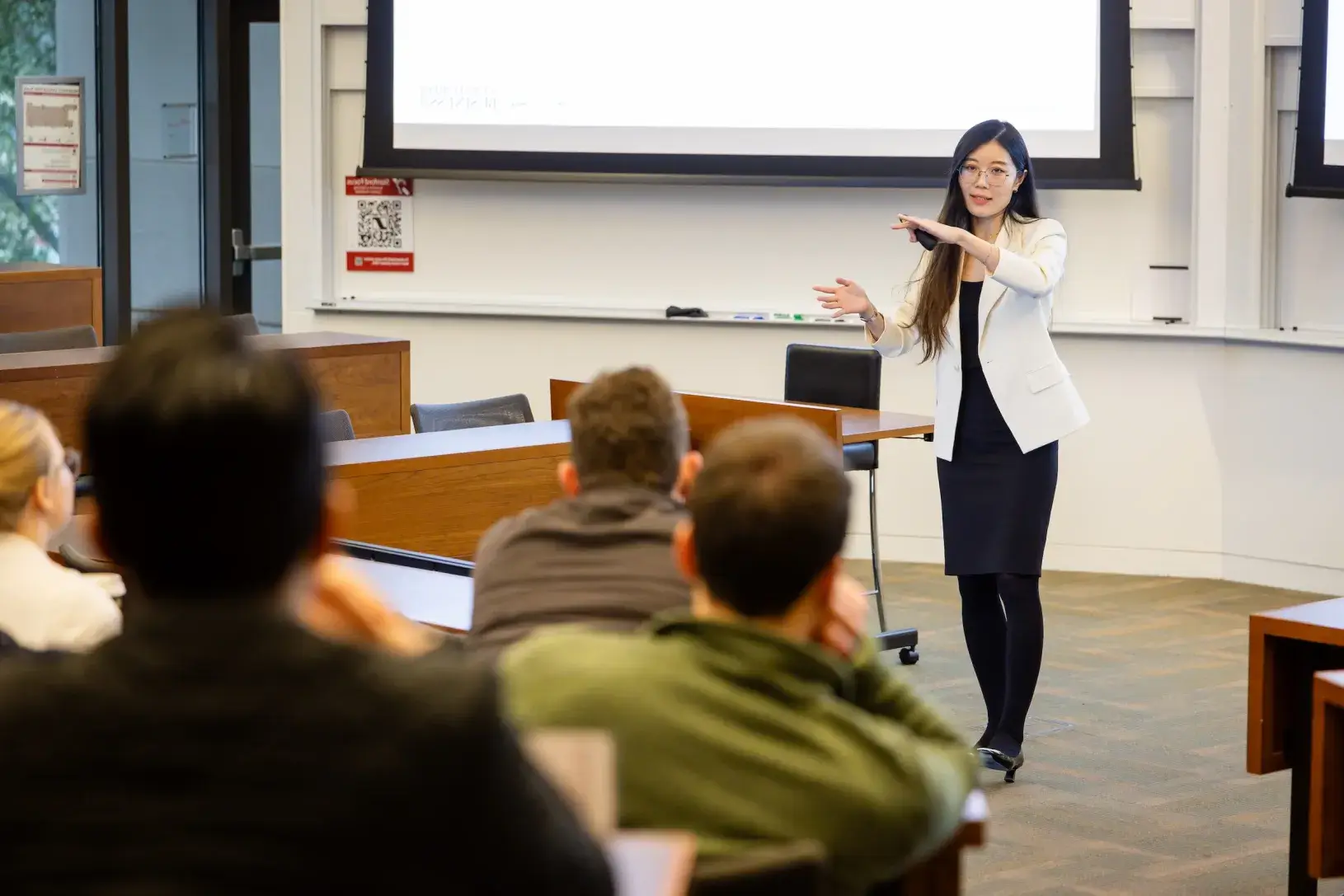 Classroom with professor speaking on AI 