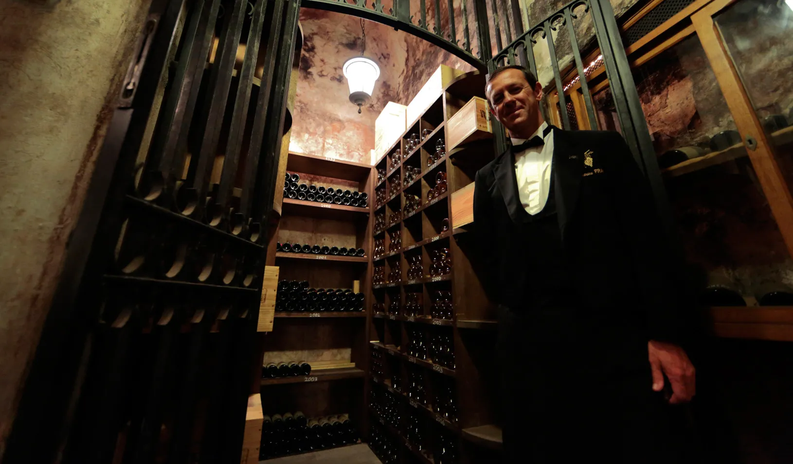 Patrice Frank, chef sommelier of the Hotel de Paris, poses in the cellar of the Hotel de Paris in Monaco June 19, 2013. (Reuters photo by Eric Gaillard)