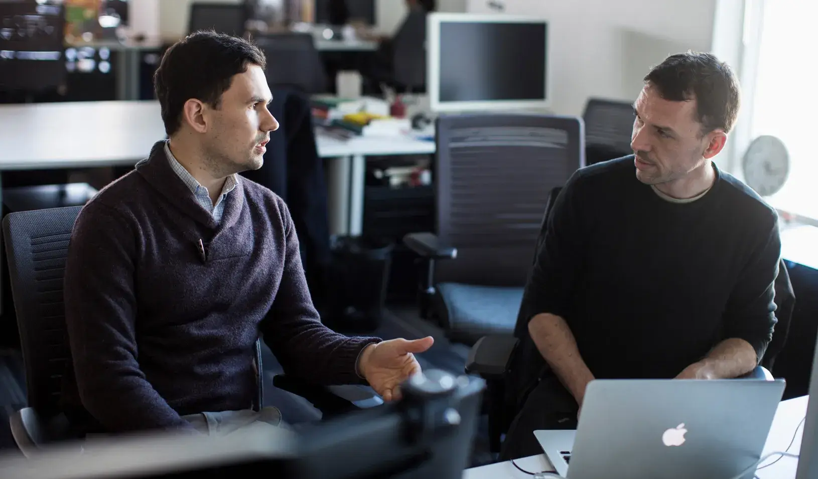 Discussing work in San Francisco (Reuters photo by Stephen Lam)