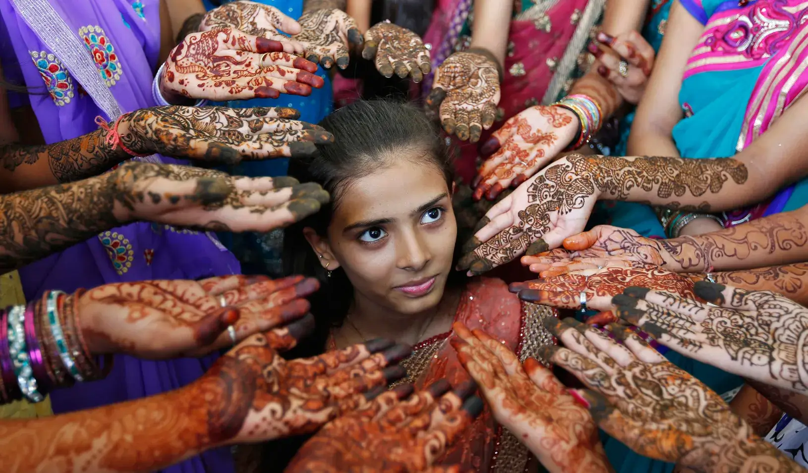 Indian school children during a henna competition to mark World Population Day, 2014 (Reuters photo by Amit Dave)