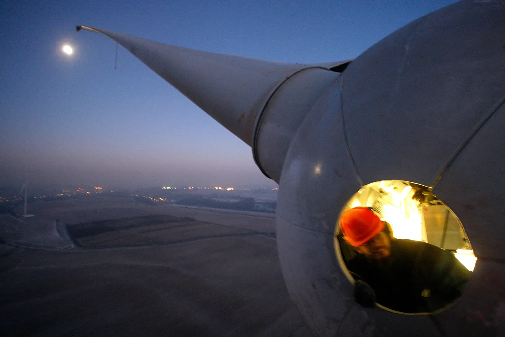 Man inside a windmill turbine