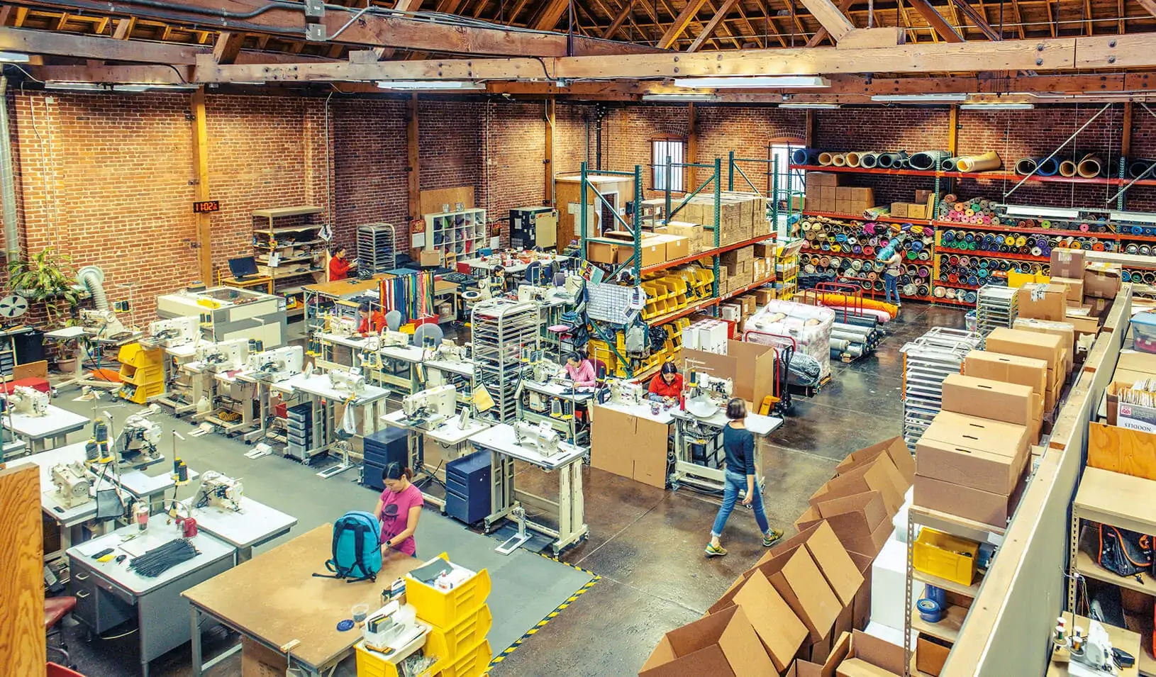 An overview shot of workers on the factory floor at Rickshaw Bags. Credit: Timothy Archibald