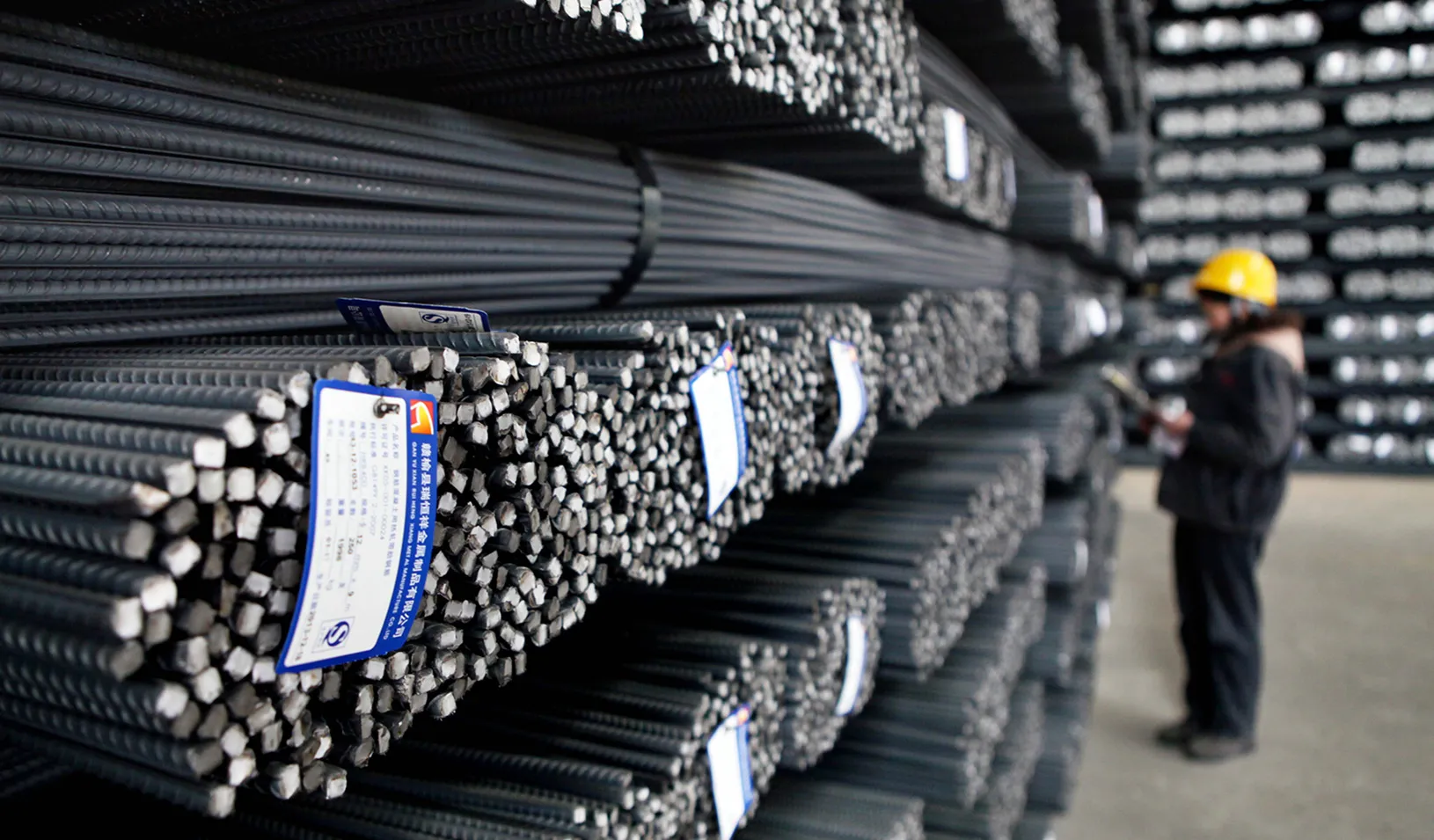 Worker at a metal warehouse. | Reuters/Stringer