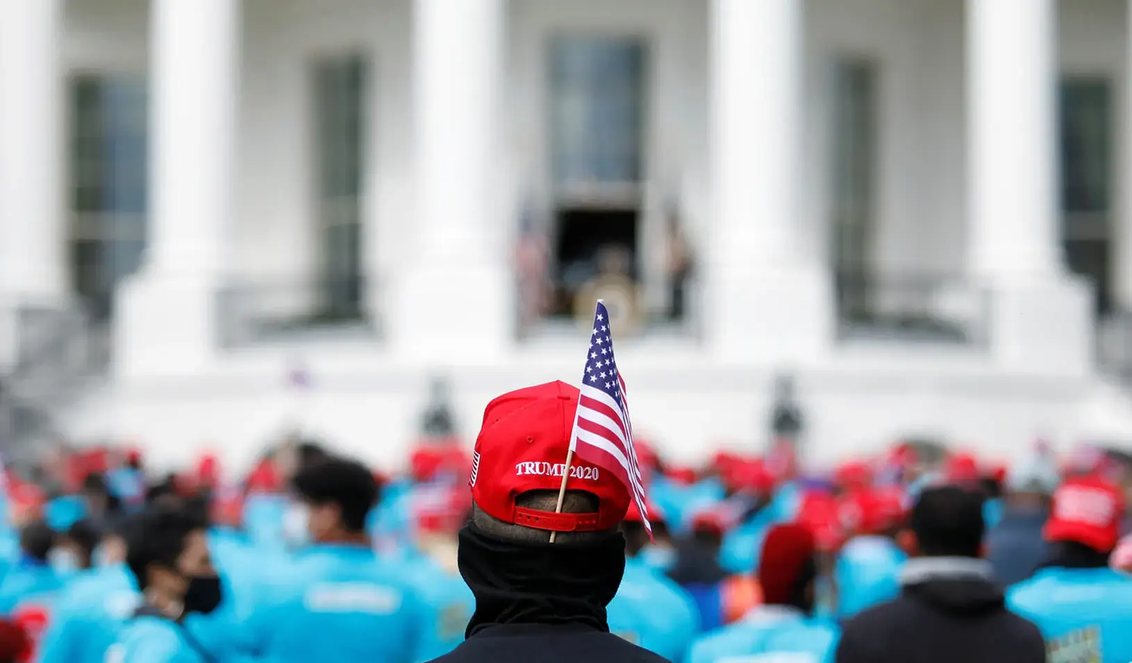  A supporter of U.S. President Donald Trump waits for the start of the president’s campaign rally on the South Lawn of the White House is calling a “peaceful protest.” Credit: REUTERS/Tom Brenner