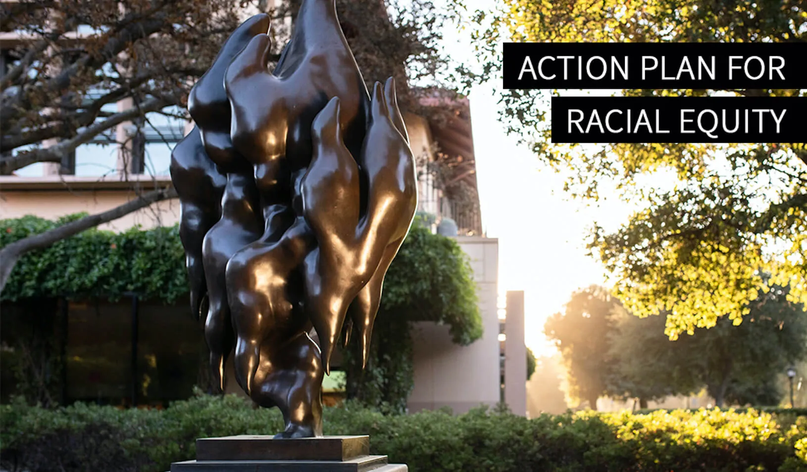 A photo of the campus sculpture, "The Flame Birds," announcing the Action Plan for Racial Equity. Credit: Elena Zhukova