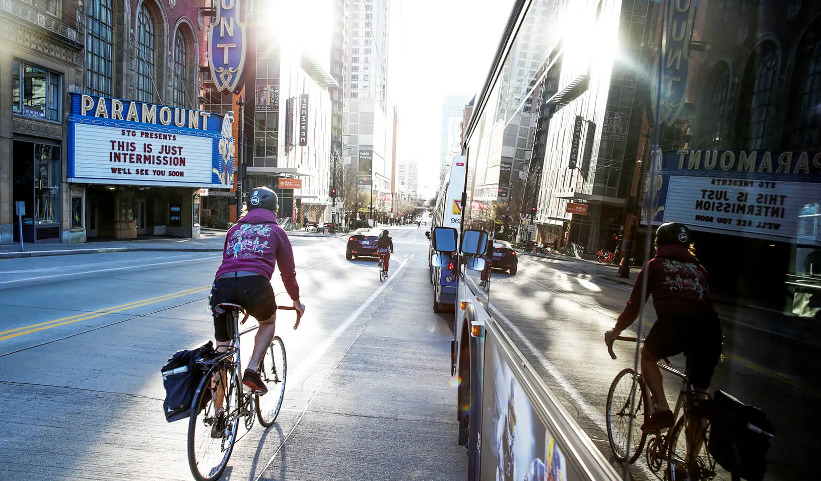Cyclist riding down a city street | Credit: Reuters/Jason Redmond