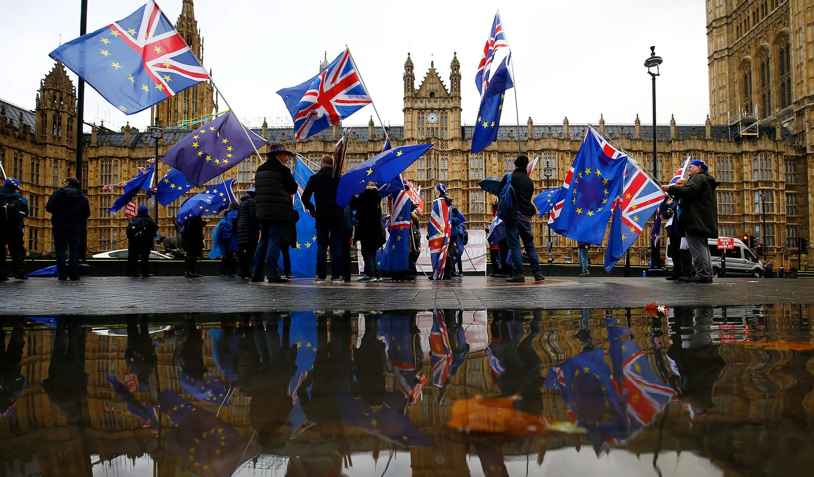 Anti-Brexit demonstrators protest outside the Houses of Parliament in London, Britain. Credit: Reuters/Henry Nicholls