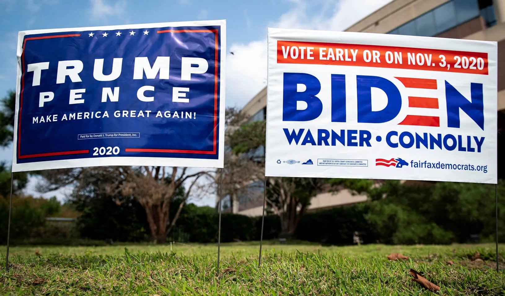 Yard signs supporting U.S. President Donald Trump and Democratic U.S. presidential nominee and former Vice President Joe Biden are seen outside of an early voting site at the Fairfax County Government Center in Fairfax, Virginia. Credit: REUTERS/Al Drago