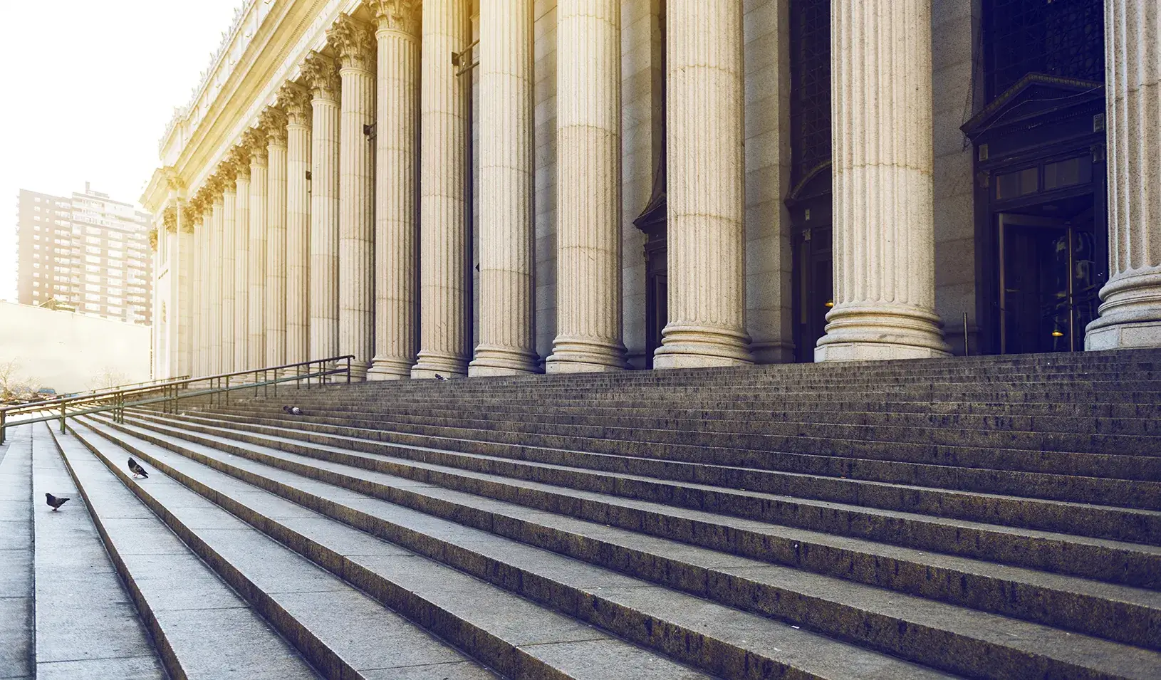 Courthouse steps at dawn. Credit: iStock/ozgurdonmaz