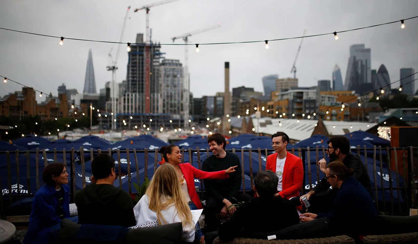 People drink and socialize at the Skylight Bar following the outbreak of the COVID-19 in London. Credit: Reuters/Henry Nicholls