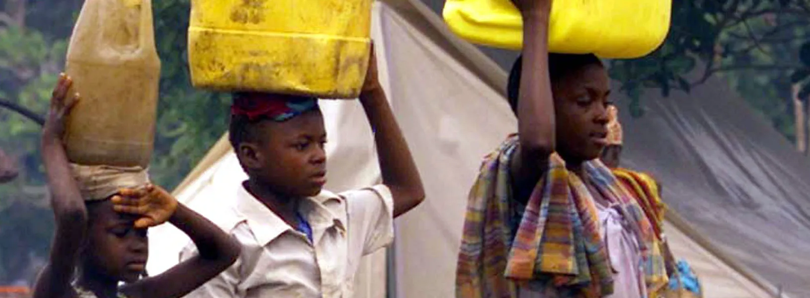 Children carrying water buckets