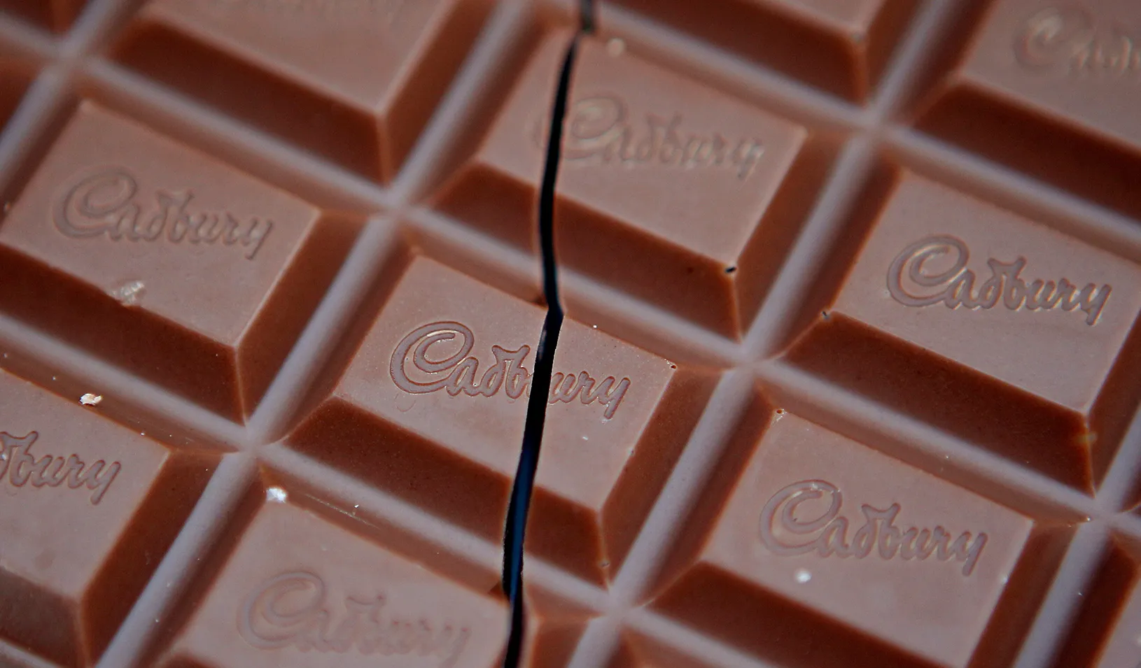 A cracked Cadbury chocolate bar