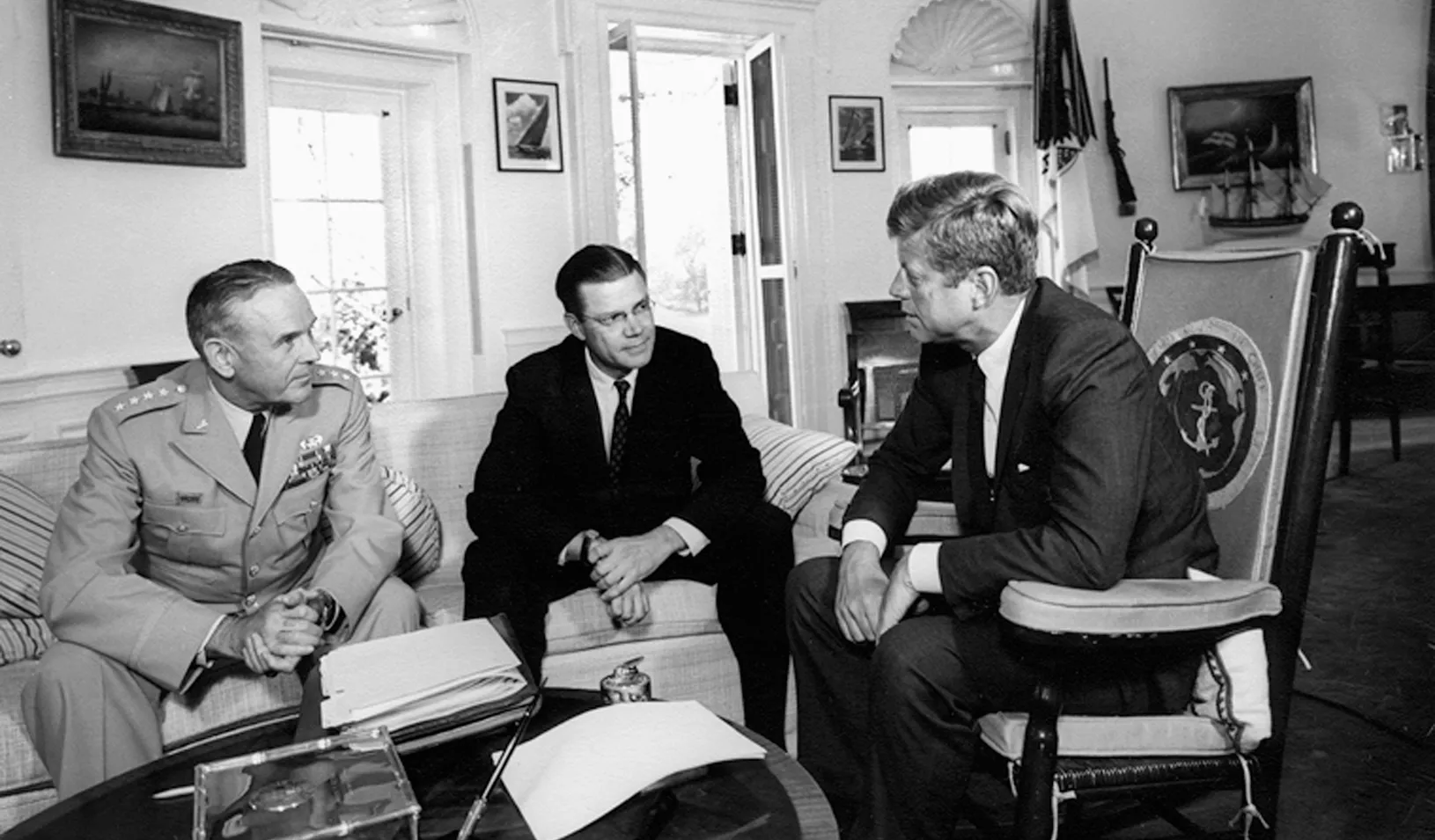 John Kennedy meeting with staff in the White House
