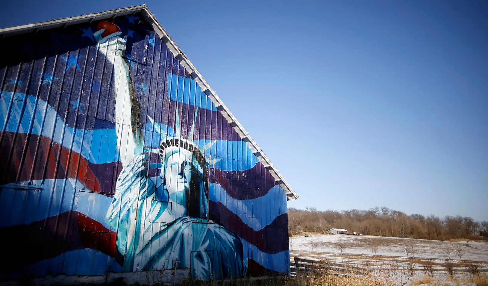 A barn is painted with an image of the Statue of Liberty and a U.S. flag in Mt. Vernon, Iowa