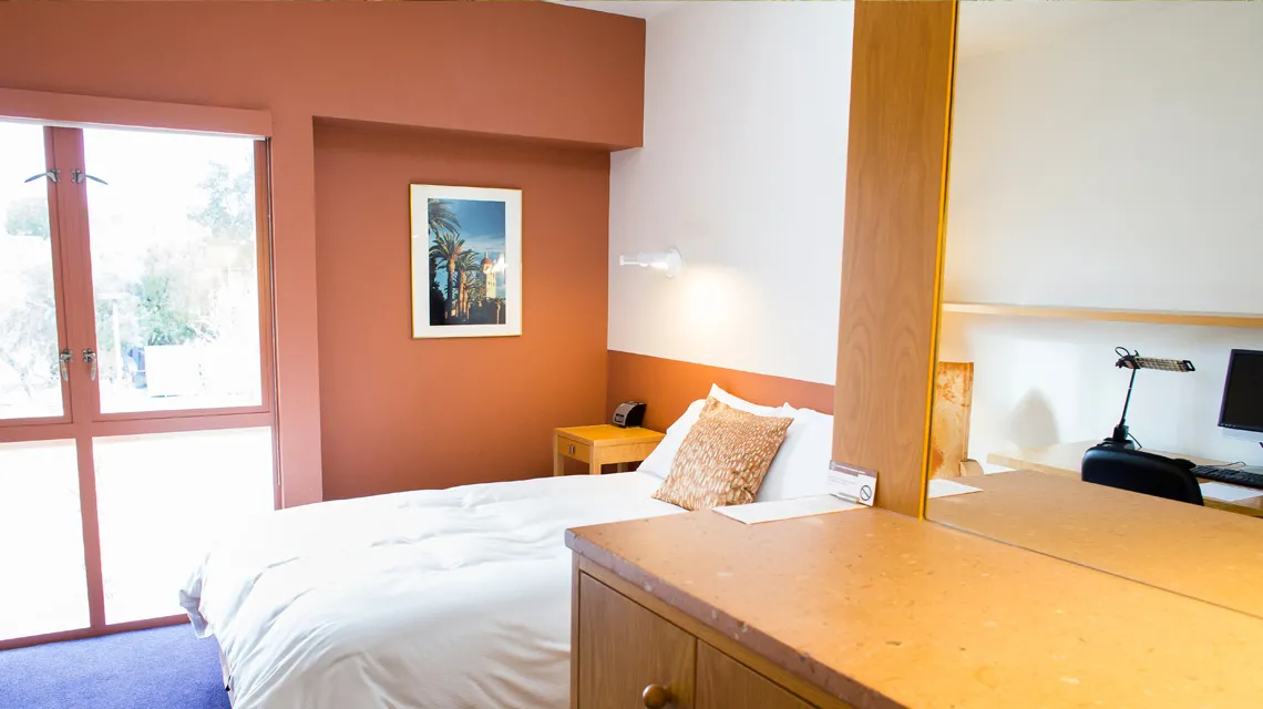 Bedroom of a suite in Schwab Residential Center