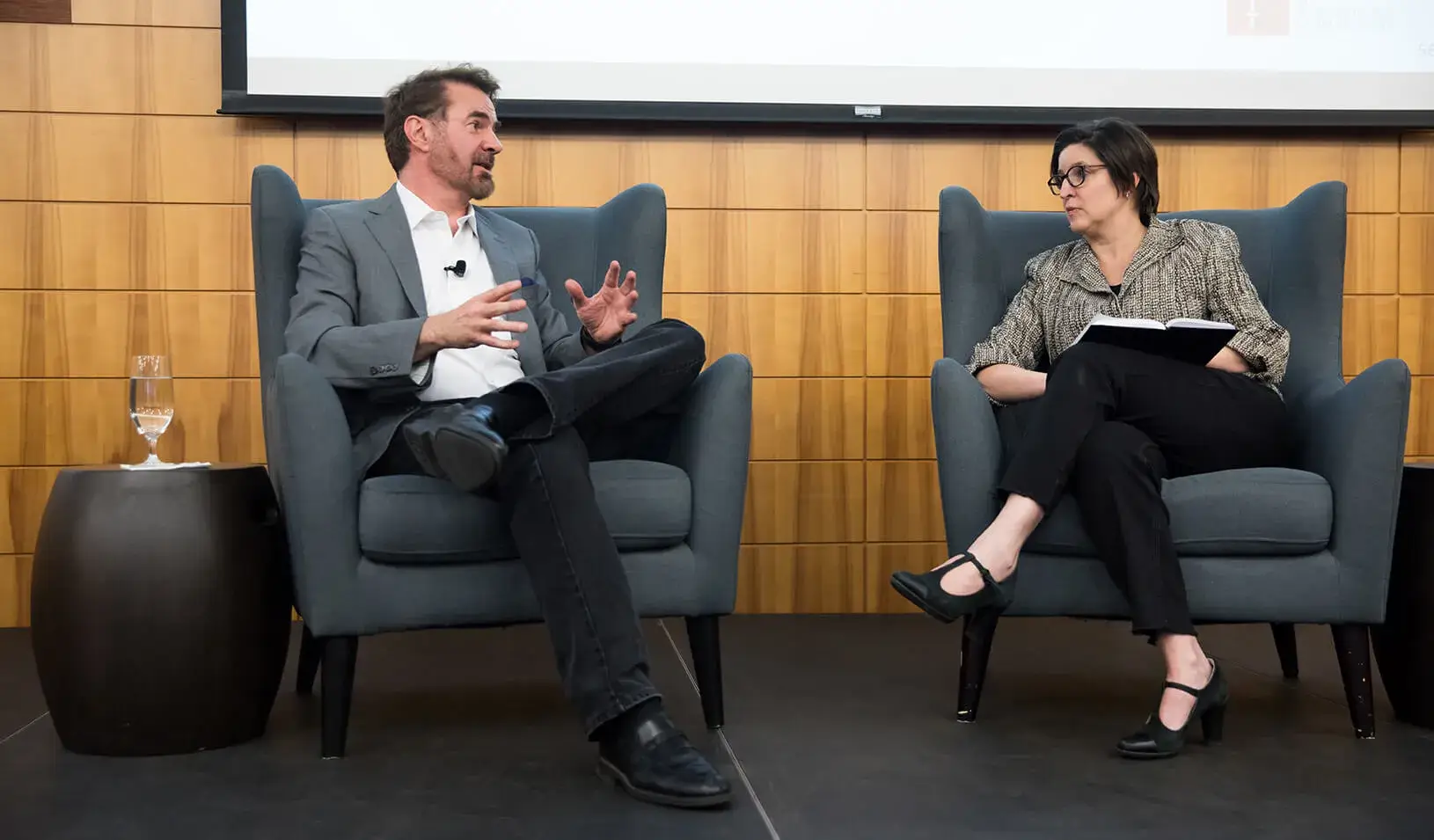 HAI Distinguished Fellow Erik Brynjolfsson and Stanford GSB Professor Susan Athey discuss the ethics of AI at a recent conference, Credit: Holly Hernandez