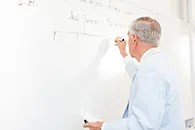 Irv Grousbeck at a whiteboard