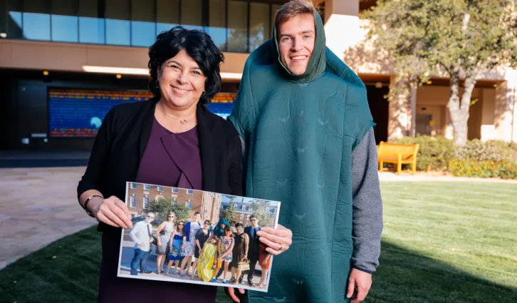 Portrait of Michele Gelfand and a student dressed in her pickle costume. Credit: Elena Zhukova