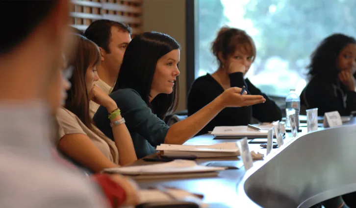 A female student speaking in class.