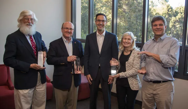 Alumni award winners with Dean Levin. | Stacy Geiken