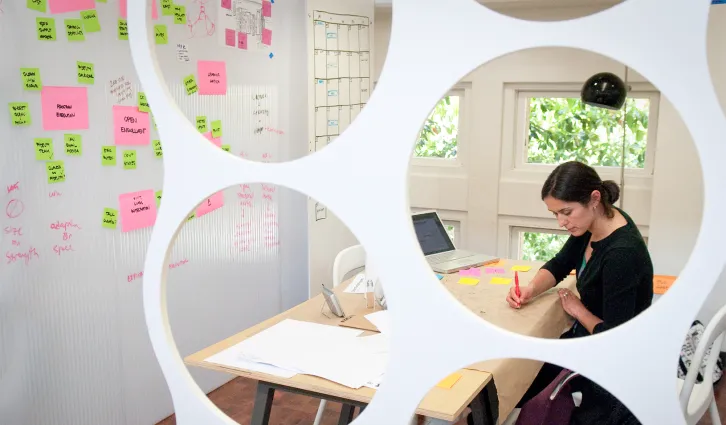 woman engaging in design thinking