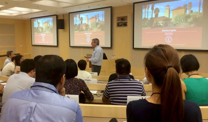 Faculty Director Yossi Feinberg teaching in Stanford Ignite-Beijing's Enhanced Classroom | Stanford GSB