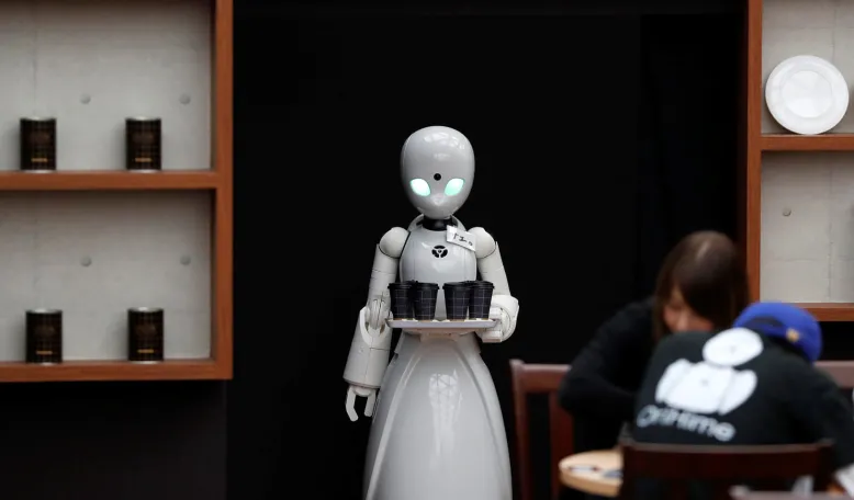 Remotely controlled robots OriHime-D, developed by Ory Lab Inc. to promote employment of disabled people, serve customers at a cafe in Tokyo, Japan. Credit: Reuters/Issei Kato