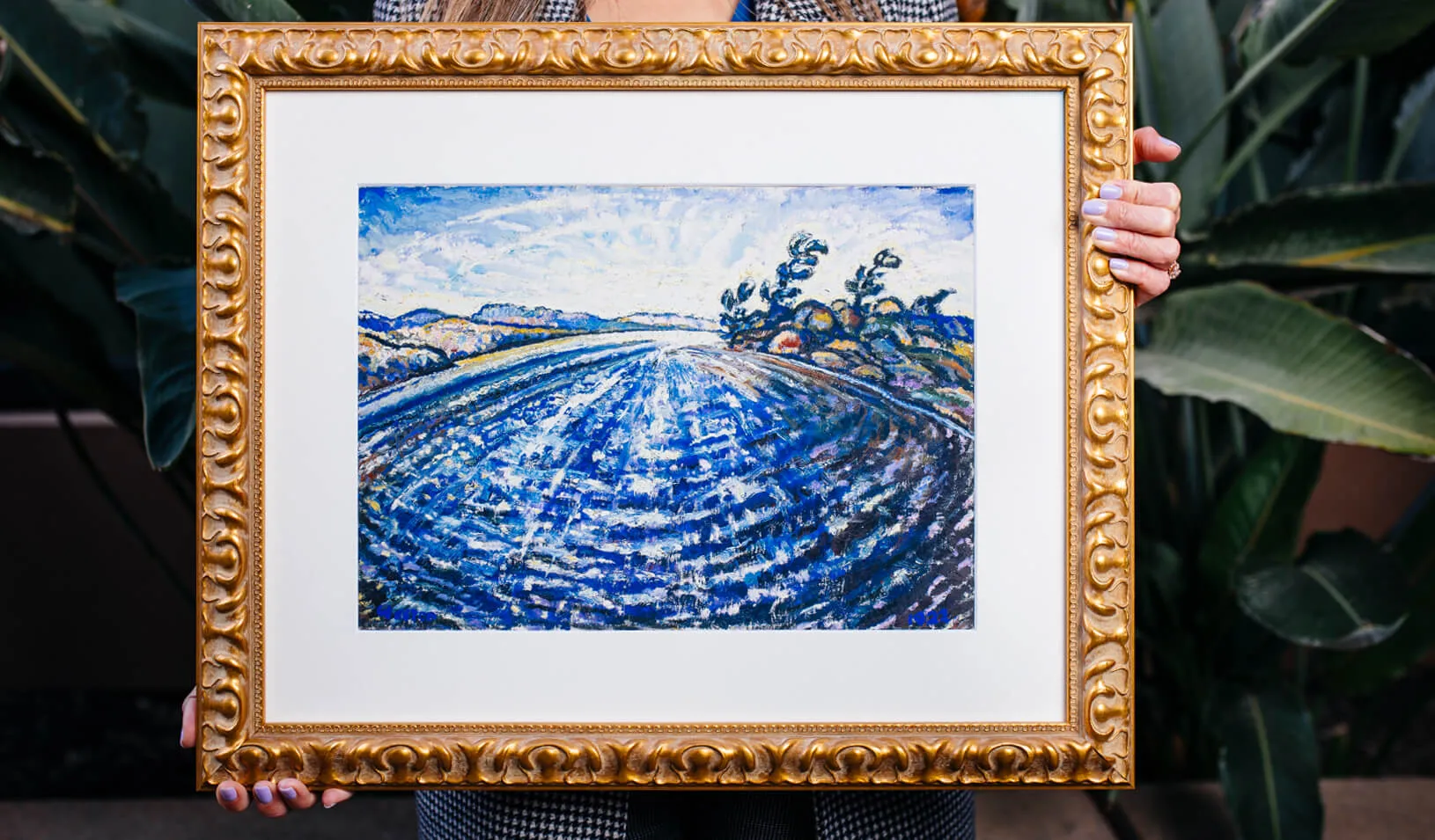 A close up of Szu-chi Huang’s reproduction of Winds, Upper Ausable Lake by Harold Weston that hangs in her office. Credit: Elena Zhukova