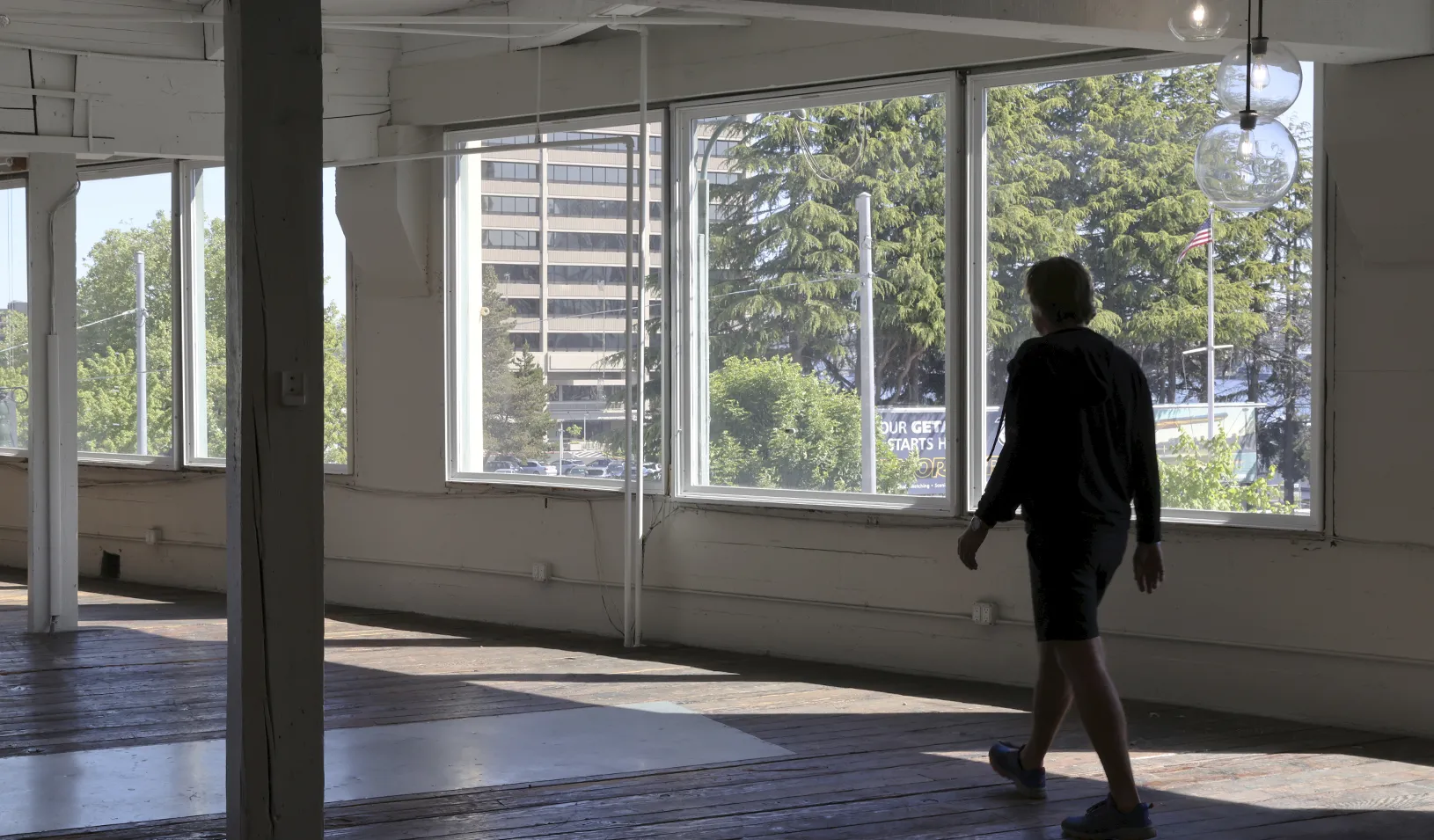 A man walks through empty office space in Seattle. Credit: Reuters/Karen Ducey