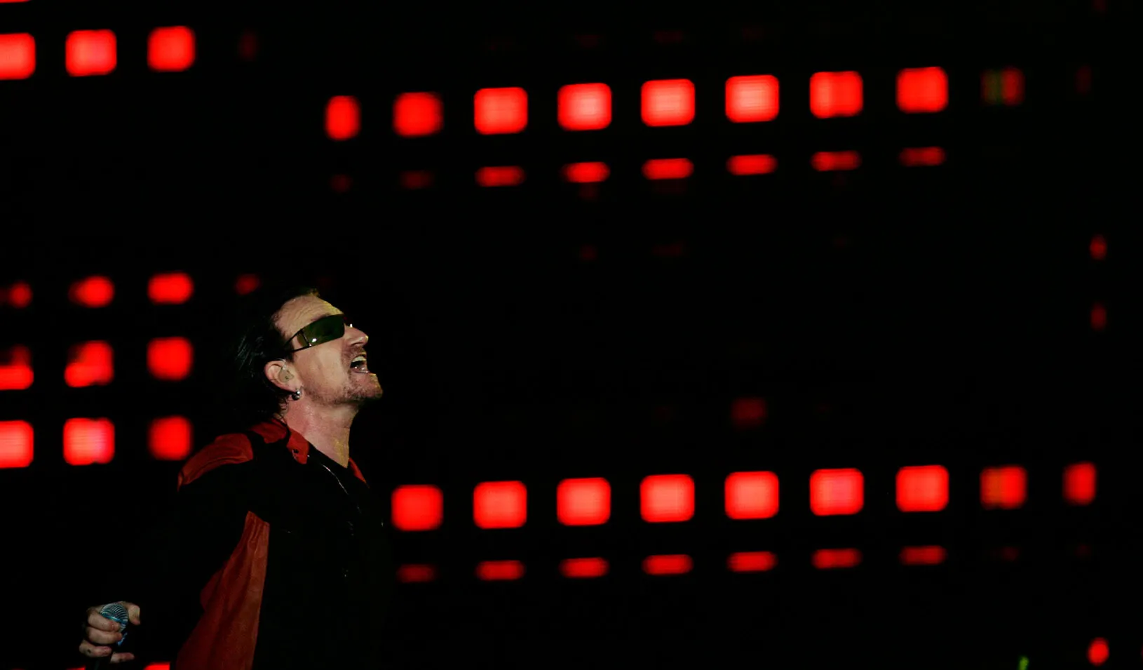 U2's lead singer Bono performs during their 'Vertigo' tour concert in Buenos Aires. Credit: REUTERS/Marcos Brindicci