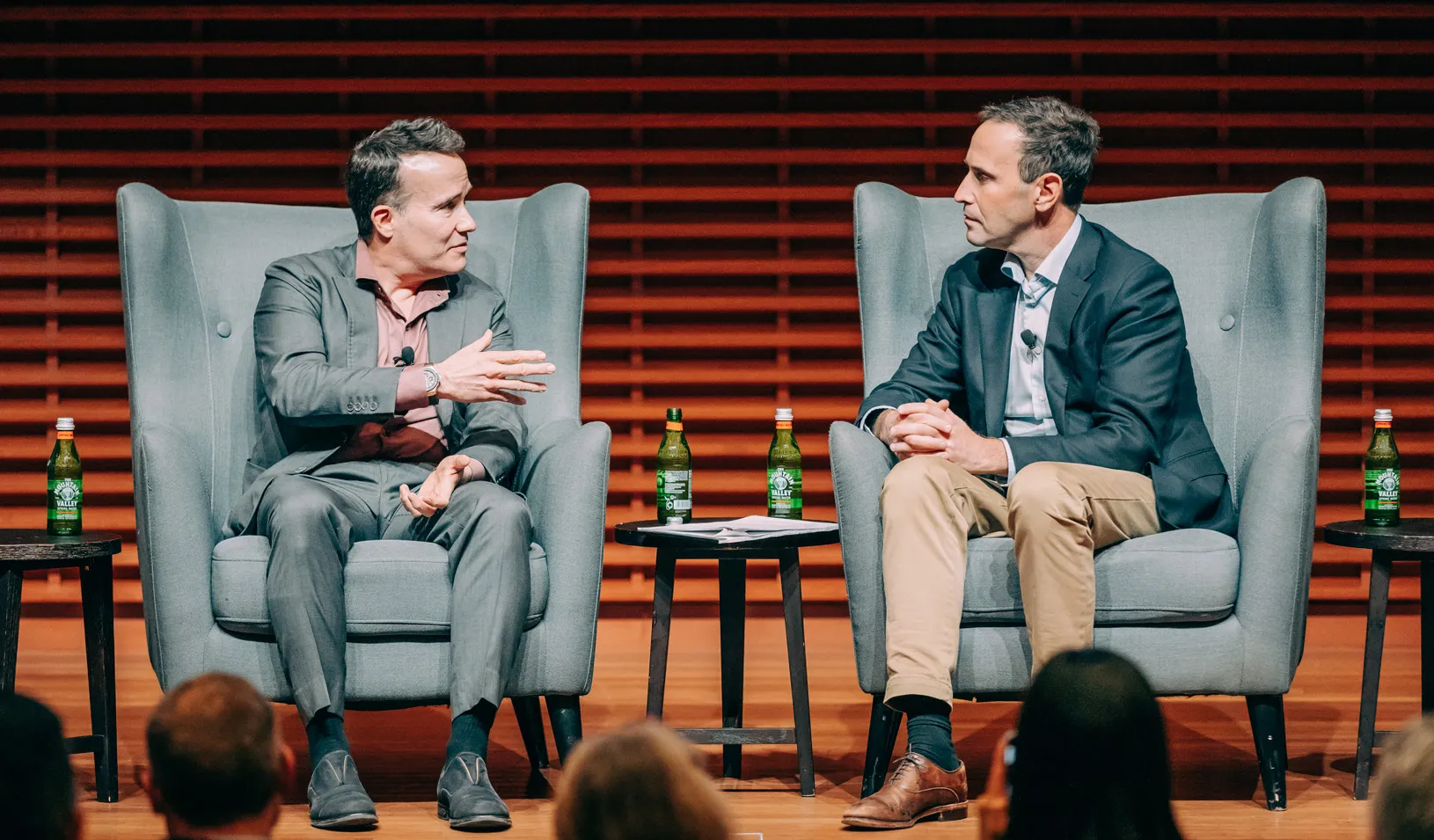Photo of Tom Chavez (left) and Jonathan Levin (right) in conversation in CEMEX auditorium. Credit: Joel Danielson