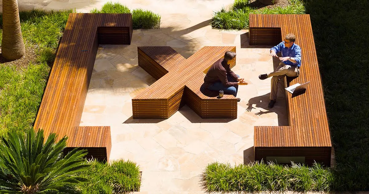 Two executive education participants discuss their course outside.