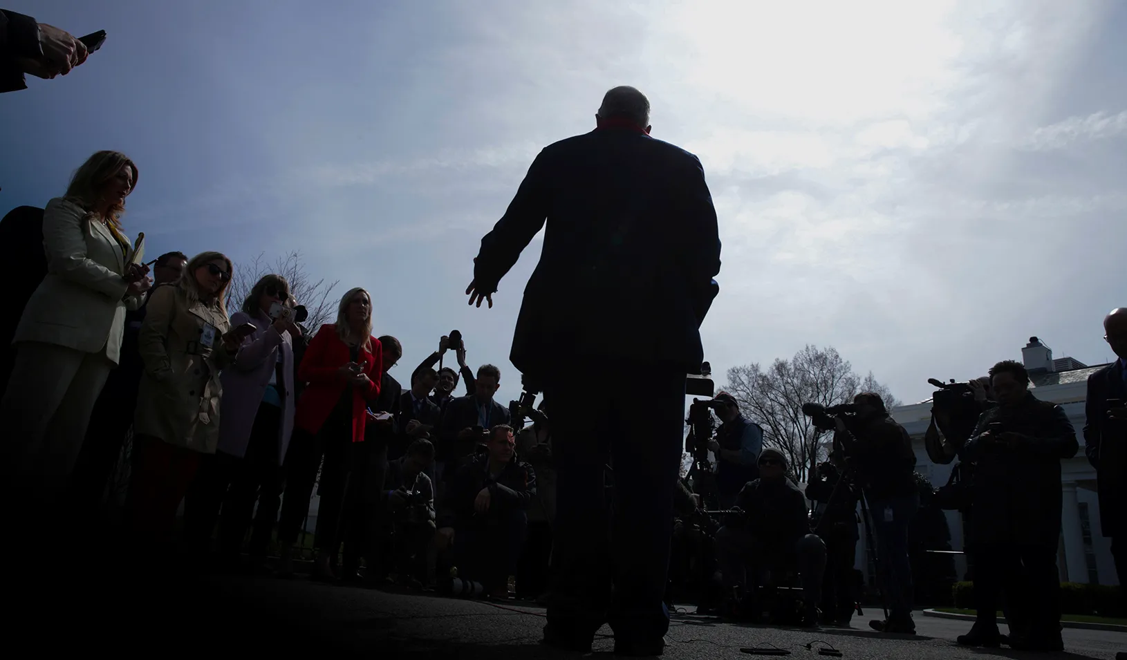 A man speaks to reporters about the response to the corona virus outbreak. Credit: Reuters/Jonathan Ernst