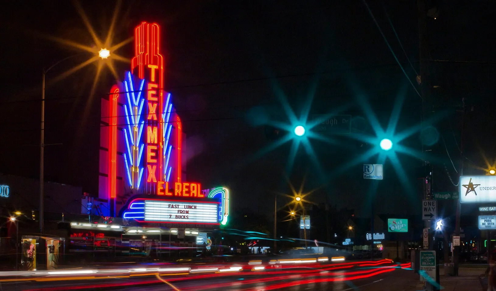 Superstar Chef Bryan Caswell's Tex-Mex food haven El Real occupies a converted movie theatre and lights up Westheimer street in Houston| REUTERS/Richard Carson