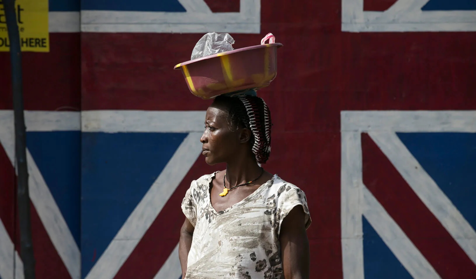 A woman walks by a sign at Devil Hole. Credit: Reuters/Baz Ratner