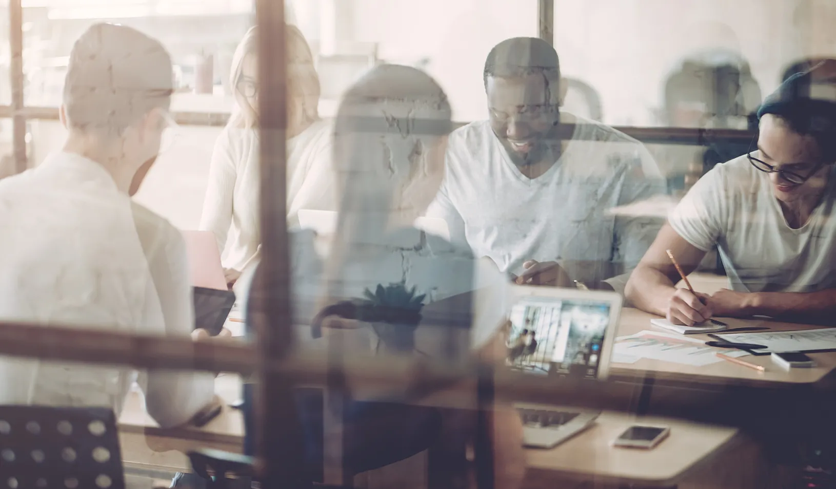 Young professionals working together. Credit: iStock/Vasyl Dolmatov