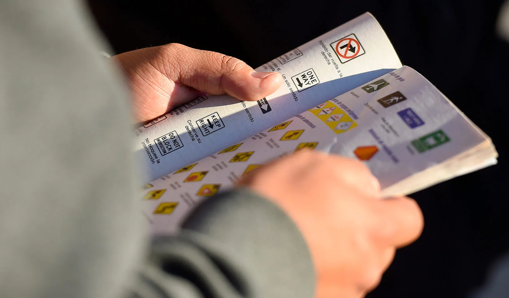 An applicant reviews a driving handbook | Reuters/Gus Ruelas