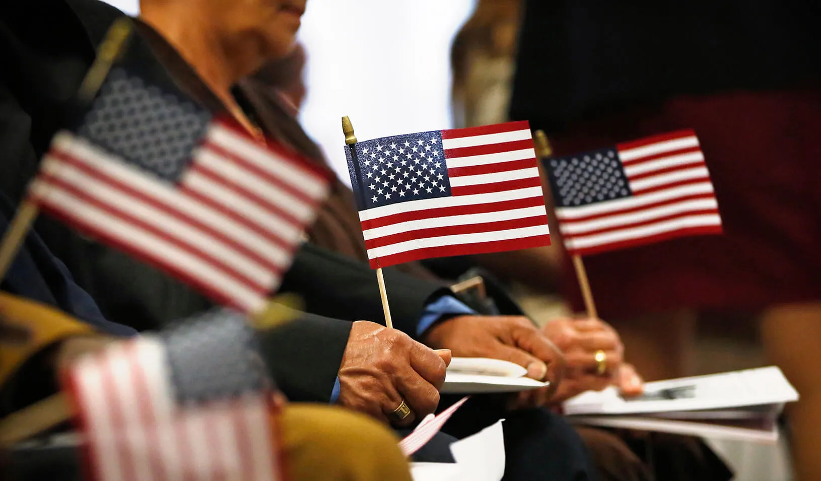 Immigrants partake in a naturalization ceremony to become new citizens of the U.S. | Reuters/Brendan McDermid