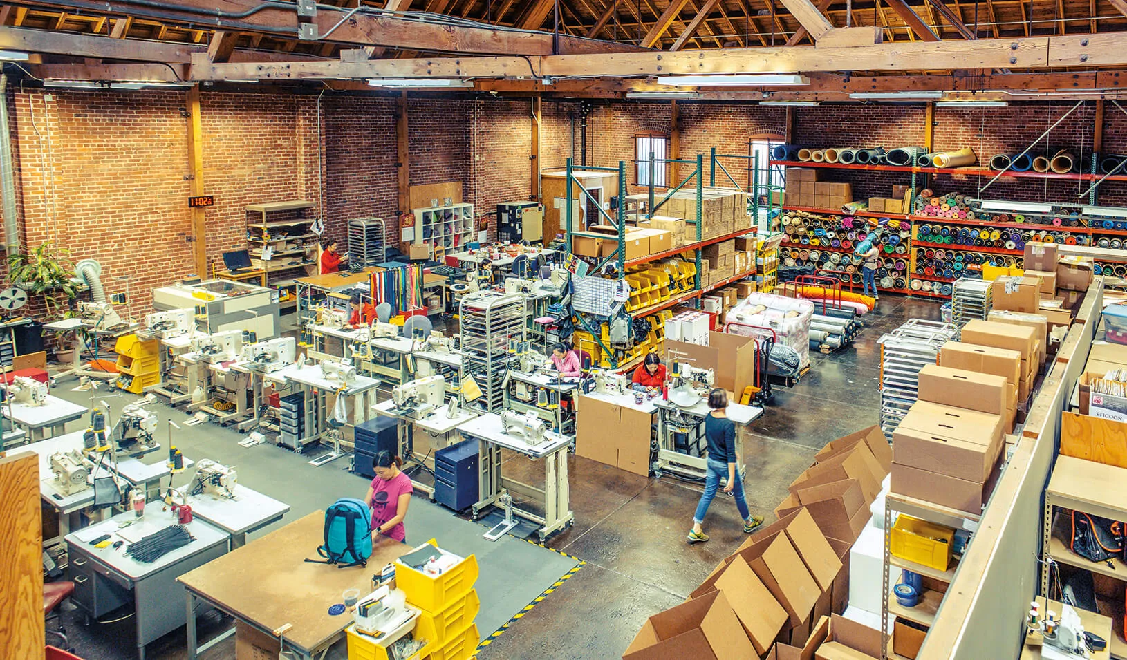 An overview shot of workers on the factory floor at Rickshaw Bags. Credit: Timothy Archibald