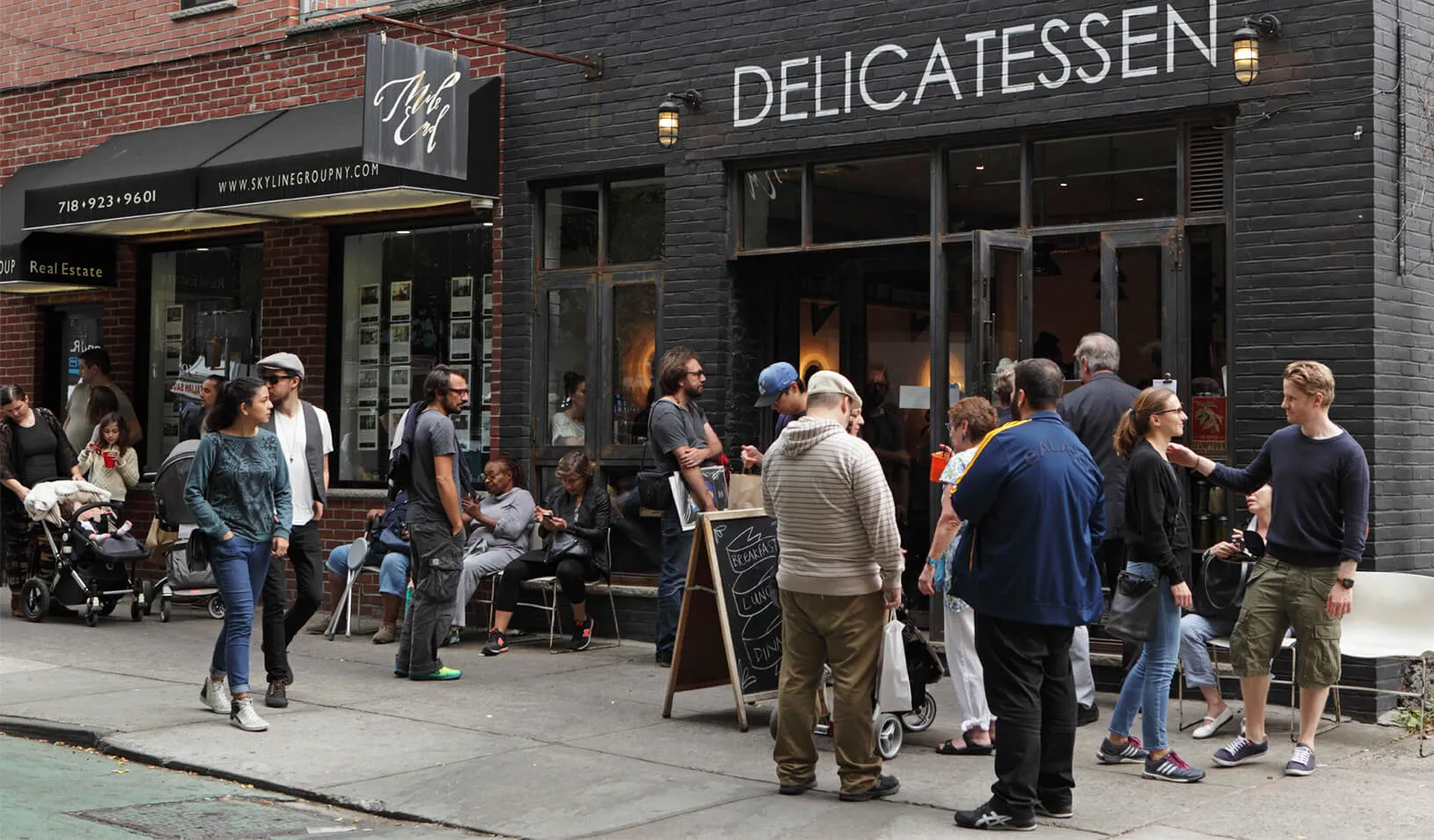 People lined up to buy lunch from Mile End Delicatessen in Brooklyn, New York | iStock/Andrew Cribb