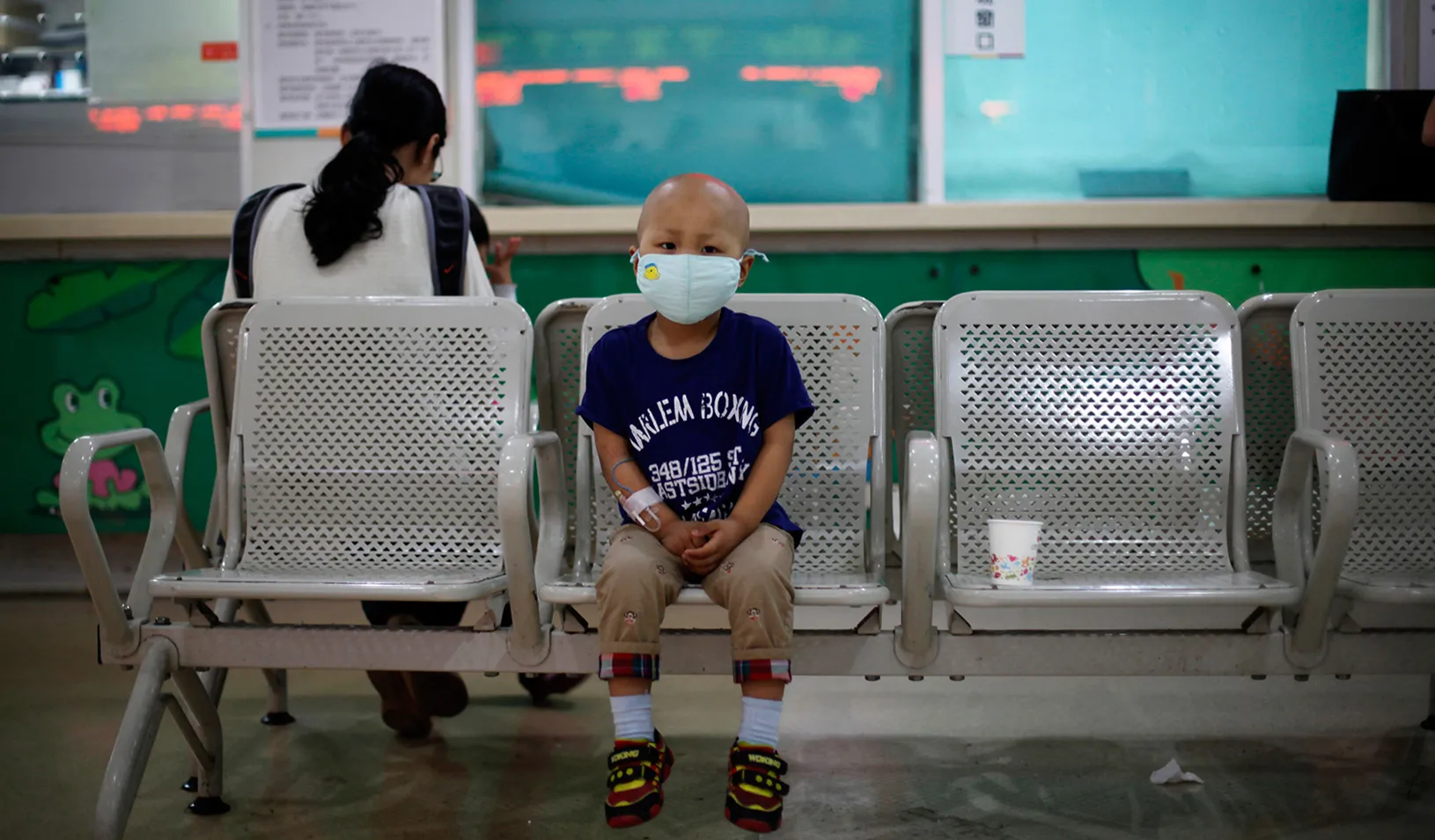 A boy in a hospital waiting room in Shanghai