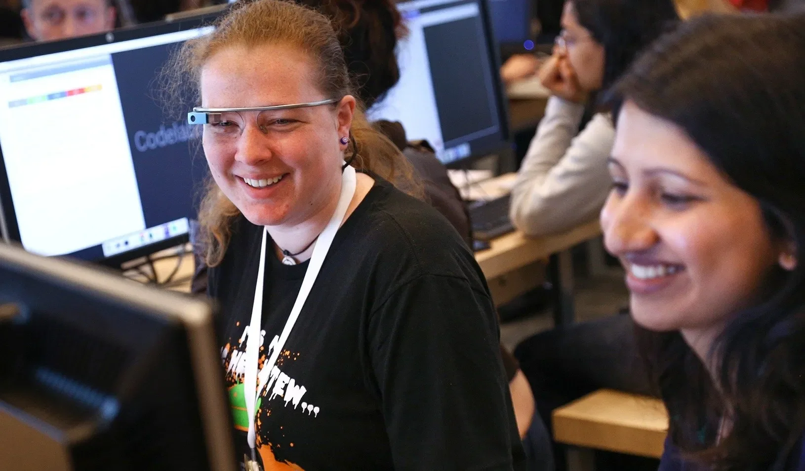 Women sitting at computers | Reuters/Elijah Nouvelage