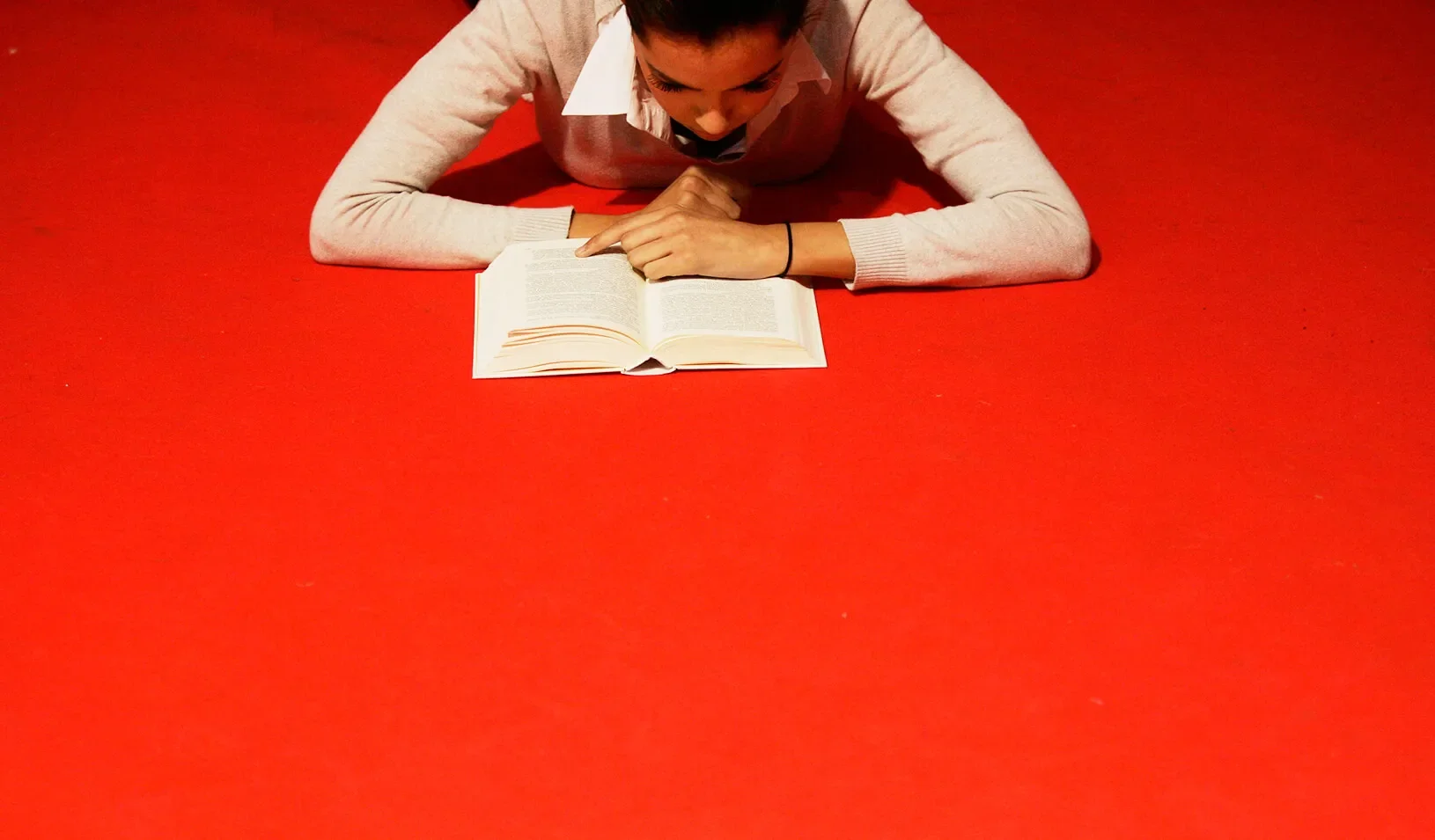 A model relaxes backstage at a fashion show in Pontevedra, Spain | Reuters/Miguel Vidal